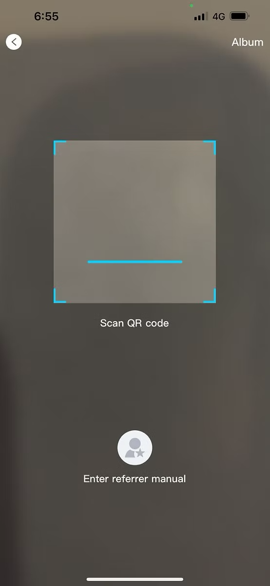 Winbox app QR scanner screen for entering a referrer, with an Enter referrer manual option underneath